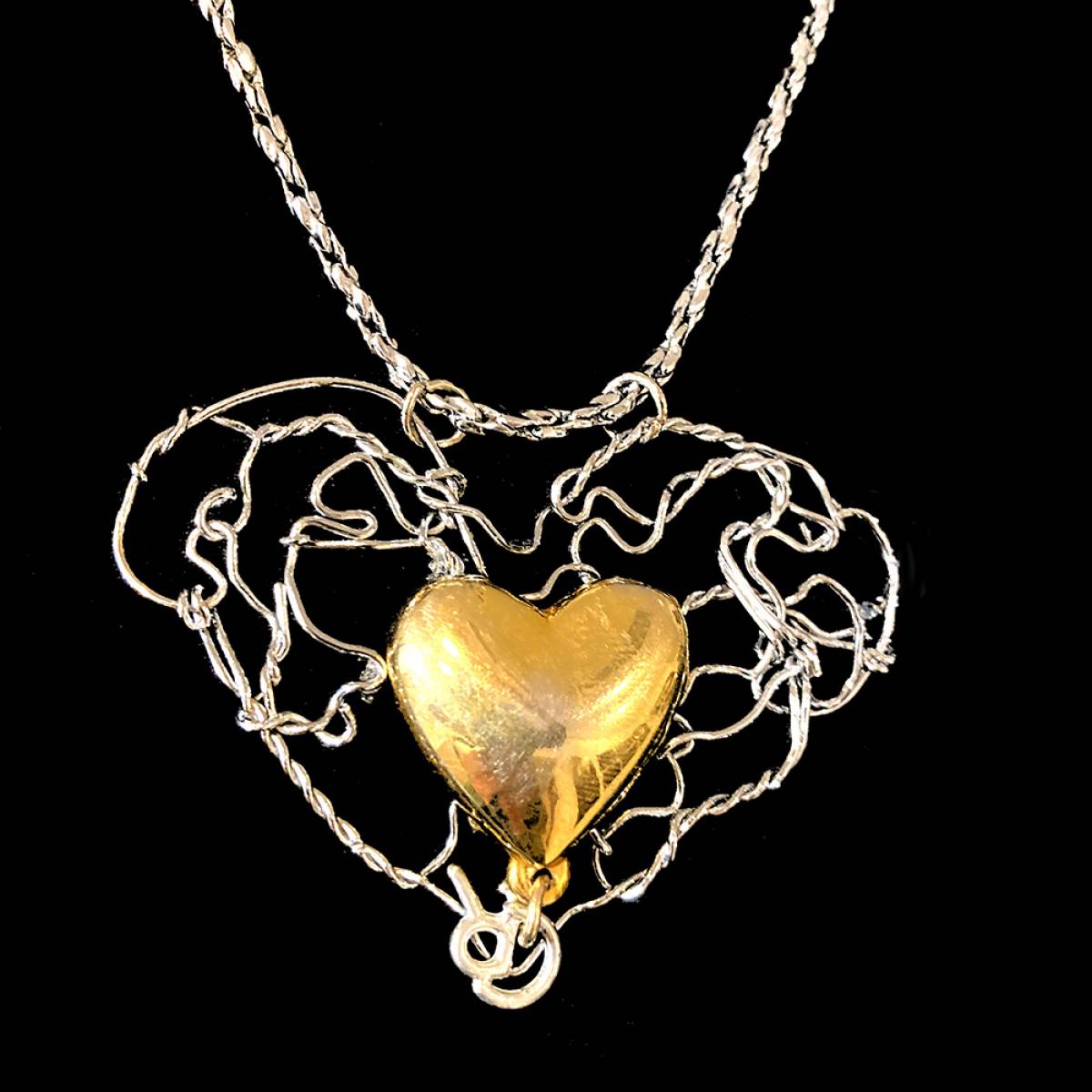 Art-Shopping de Noël : Cœur doré et muselet de champagne chromé de l'artiste Corinne Reinsch